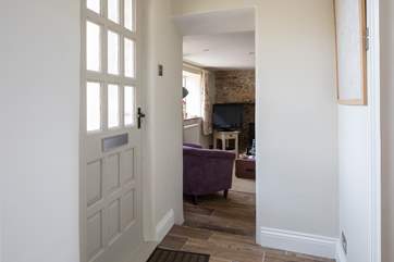 View from the kitchen, the front door is to the left and the bathroom to the right.