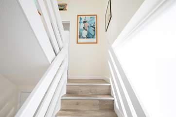 Just a few steps takes you up to the first floor where you will find the stunning living-room for ultimate relaxation.