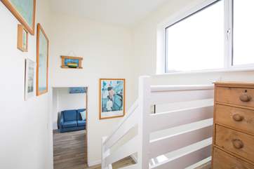 The first and second floors are on mezzaine floors, so they don't have full staircases in between them!