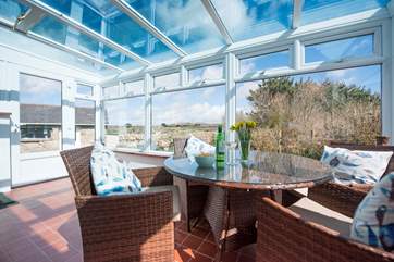 Enjoy the views from the sun-room.