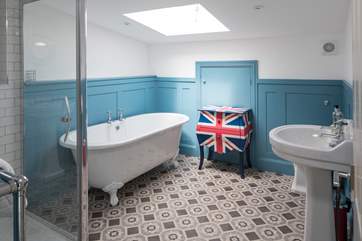 The en suite to bedroom 5 (the family room) has a bath and a shower cubicle. Perfect to wash away the day's sand and suncream.