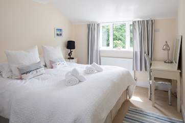 Bedroom 2 also offers a glorious super-king size bed, which can also be configured as twins on request.