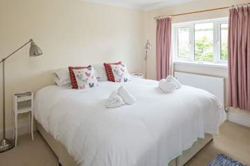Bedroom 4 is a lovely and welcoming bedroom, which offers a super-king size bed. This bed can also be configured as twins on request.