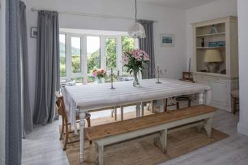 If the weather doesn't allow al fresco dining, why not banquet together in this lovely dining-room. The views are equally as stunning from inside.