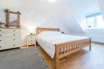 The first floor bedroom with a 6' super-king size bed.
