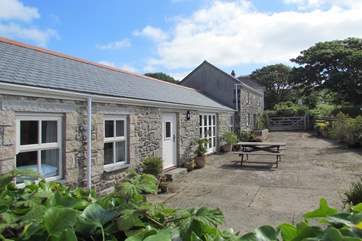 The enclosed terrace to the front of Mazey's Cottage, south-facing so perfect for a breakfast in the sunshine!