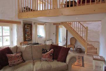 The gallery, home to a futon/sofa bed overlooks the sitting-room.