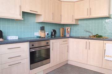 The well-equipped kitchen.
