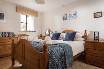 Master bedroom is full of light.