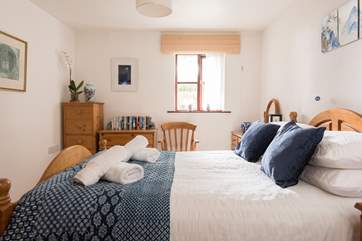 The light and bright master bedroom.