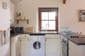 The well-equipped kitchen in the open plan living space.
