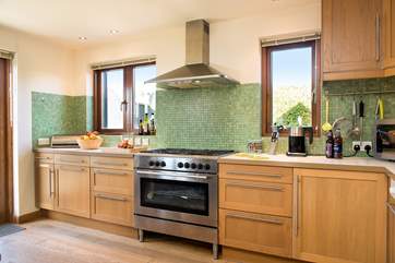 Porth View has a very well-equipped kitchen-area which overlooks the garden.