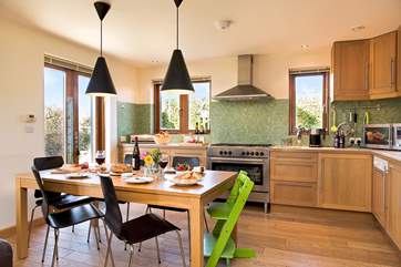 Patio doors lead out from the kitchen-area to the garden.