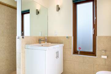The shower-room on the ground floor is ideal for rinsing off after a great day on the beach.