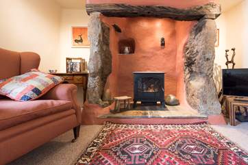 Relax by the wood-burner effect electric stove.