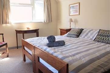 The second bedroom on the first floor has a zip and link bed (super king or twin).