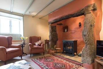 The cosy sitting-room, with a touch of Cornish charm.
