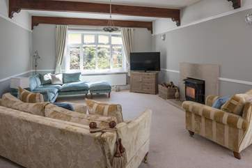 The main sitting-room boasts a glorious wood-burner. Perfect for those snuggly nights in.