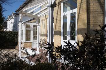 The garden can be viewed from most of the rooms in the house, with numerous patio doors out to the pool area