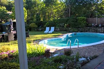 Picture yourself lounging by the pool with the sun shining and all of the family smiling.