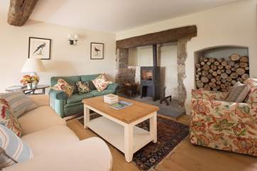 Another view of the sitting-room which has cosy clusters of sofas and armchairs and so a great gathering room for all the family.