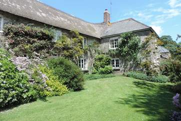 Affeton Barton is the greater part of this historic Devon longhouse. It is filled with character, has a huge private garden, tennis court and seasonal open air swimming pool.