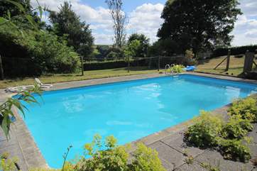 This is the open air unheated swimming pool (open during June, July and August). It is fenced but please supervise children at all times.