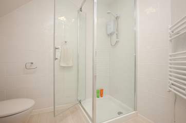 The bright, modern ensuite shower room is located on the first floor.