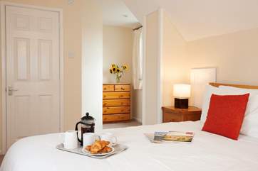 The master bedroom benefits from far-reaching views across the Solent.