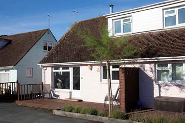 The semi-detached cottage is only setps from the beach and a short walk to the village of Seaview.