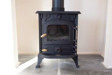 The log burner is a welcome addition in the colder months