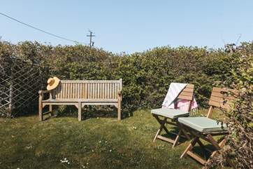 Enjoy the views from the small garden which is accessed up steep granite steps.