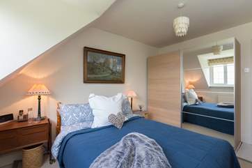 This is the double bedroom. This room also looks out over the gardens and on a clear day all the way to the Bristol Channel.