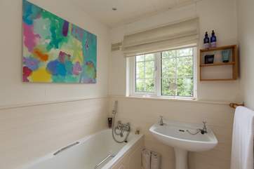 The family bathroom on the first floor. There is also a separate WC and downstairs a further shower-room with WC.