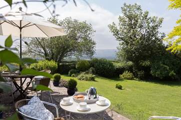 There is a gorgeous terrace overlooking the gardens and with panoromic views above Blagdon Lake to the Mendips.