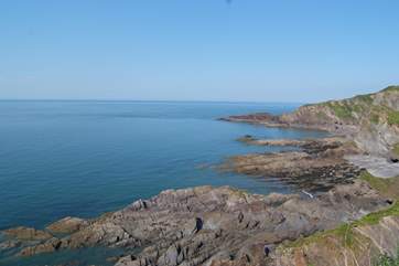 This is the nearby coastline between Ilfracombe and Berrynarbour. Lots of coves and rock pools to explore. There is a sandy bay at Combe Martin and a vast sandy beach at Woolacombe.