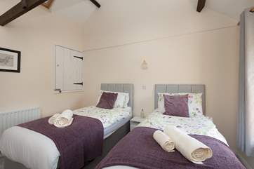There is plenty of space in this bedroom.