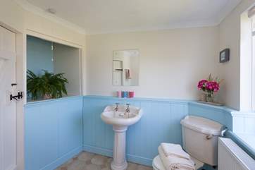 This is the cheerful family bathroom on the first floor with the bedrooms.