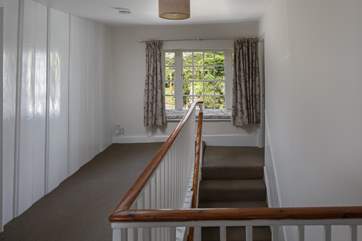 Everything is the gorgeous house is elegant, this beautiful window seat on the landing looks out over the rear garden.