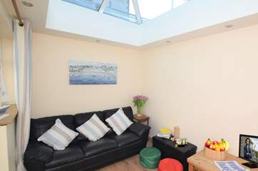 The snug just off the kitchen is a perfect hideaway for the little ones.