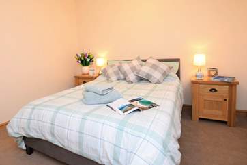 The double bedroom on the ground floor has plenty of storage.