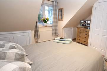 The double bedroom on the top floor is lovely and light.