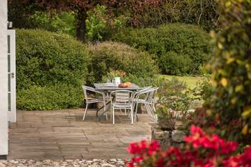 The terrace is accessed through the double doors from the kitchen.