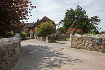 Hobnob is No 1 Stable Courtyard, the building in front of you, with parking to the right.
