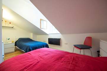 The twin bedroom (please take care of the sloping ceiling).