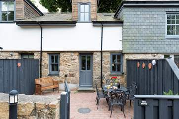 The rear entrance and private sitting-area.