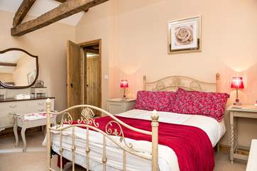 Bedroom 1 with its pretty bedstead.