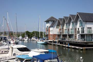 Walk around the picturesque harbour and admire the yachts.