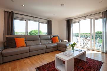 The relaxing first floor sitting-room with balcony.