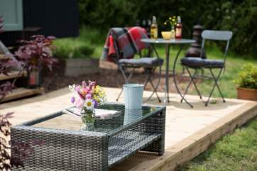 The lovely decked area has plenty of room for al fresco dining.